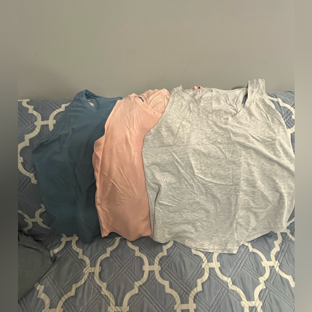 Lululemon - Set of Four Sleeveless Tops in Blue, Buff, Pink, and Gray